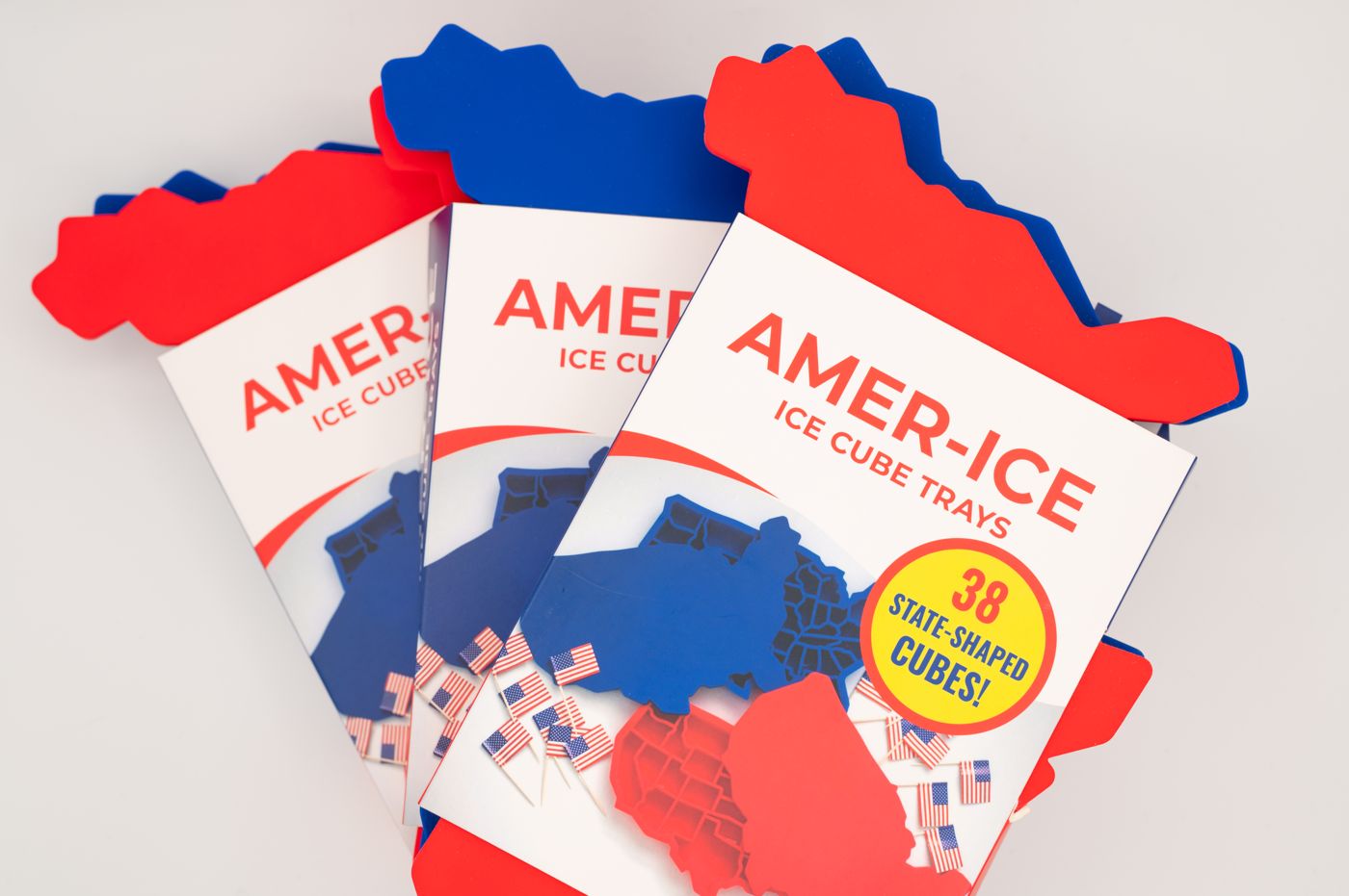 Amer-ICE packaging with red and blue USA-shaped trays and a badge reading 38 state-shaped cubes